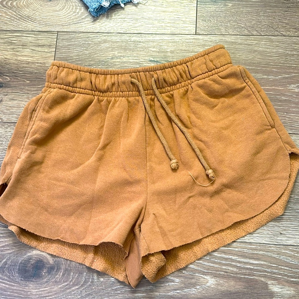 Tan orangish sweatpants shorts